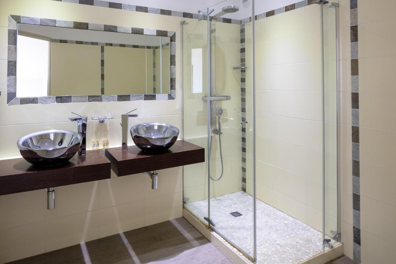 Hotel Le Ruesco Ольмето Экстерьер фото