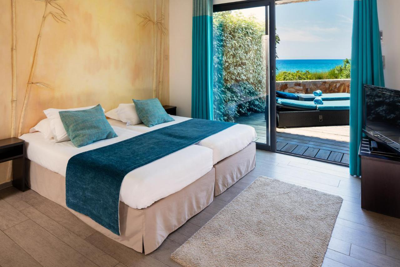 Hotel Le Ruesco Ольмето Экстерьер фото