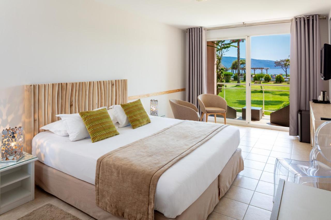 Hotel Le Ruesco Ольмето Экстерьер фото
