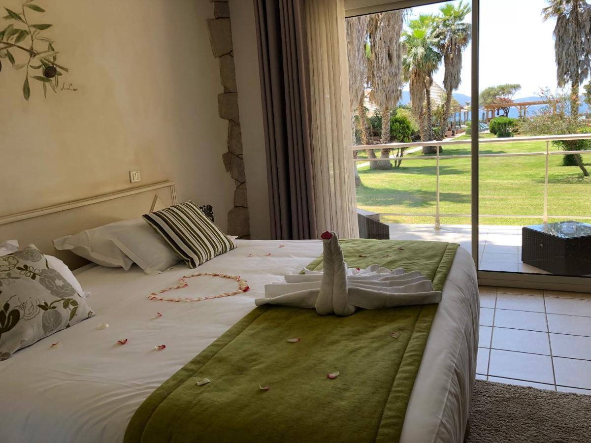 Hotel Le Ruesco Ольмето Экстерьер фото